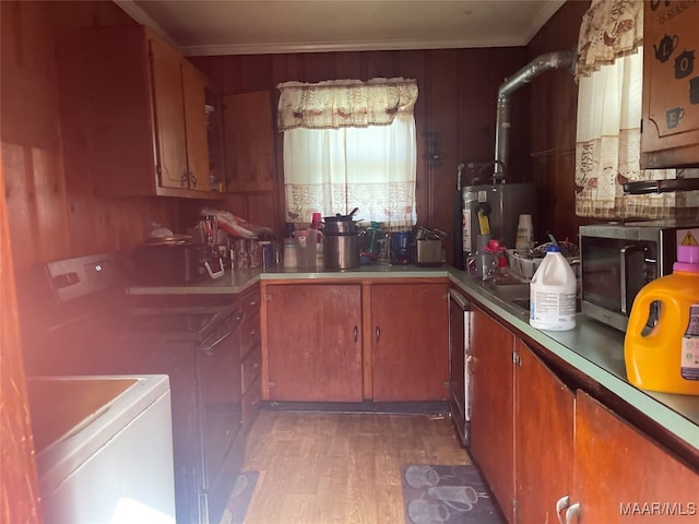 kitchen featuring gas water heater, crown molding, and dark wood-type flooring