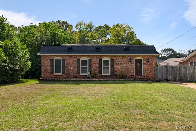 single story home with a front lawn