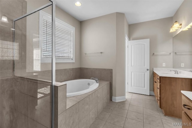 bathroom featuring vanity, tile patterned floors, and independent shower and bath