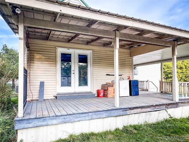 wooden terrace featuring french doors