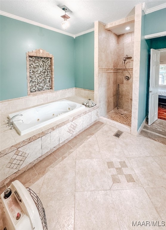 bathroom with tile patterned flooring, crown molding, shower with separate bathtub, and a textured ceiling