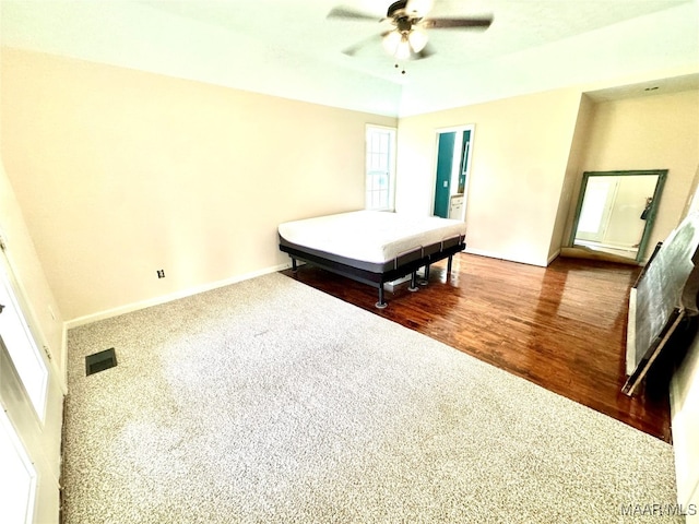 bedroom featuring ceiling fan and hardwood / wood-style floors