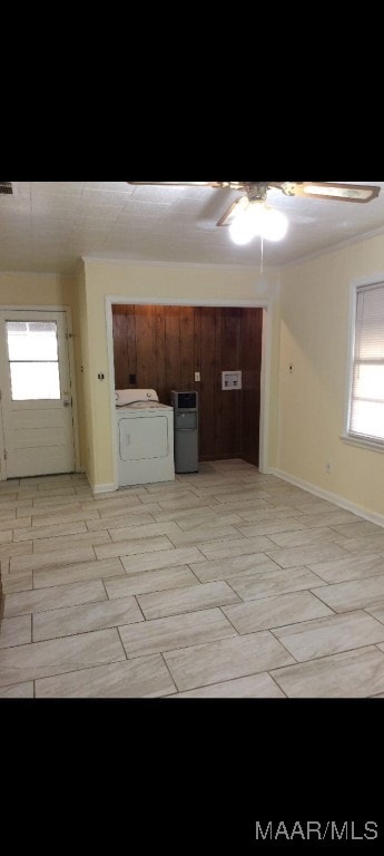 interior space with ceiling fan, light wood-type flooring, crown molding, and a wealth of natural light