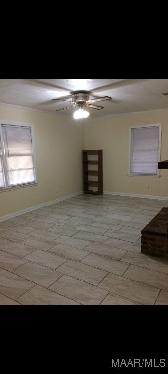 empty room featuring ceiling fan