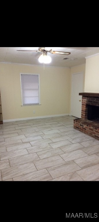 interior space featuring a brick fireplace, light hardwood / wood-style floors, and ceiling fan