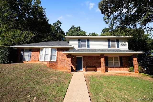 view of front of home with a front lawn