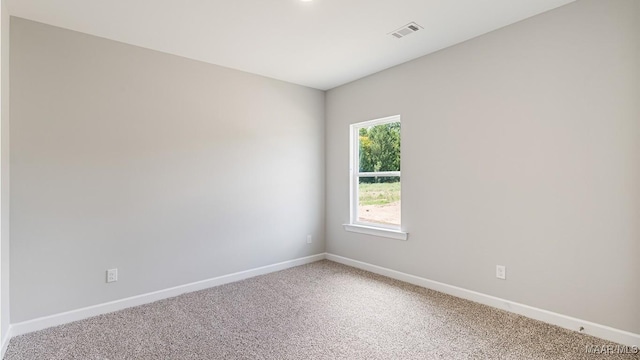 unfurnished room featuring carpet floors