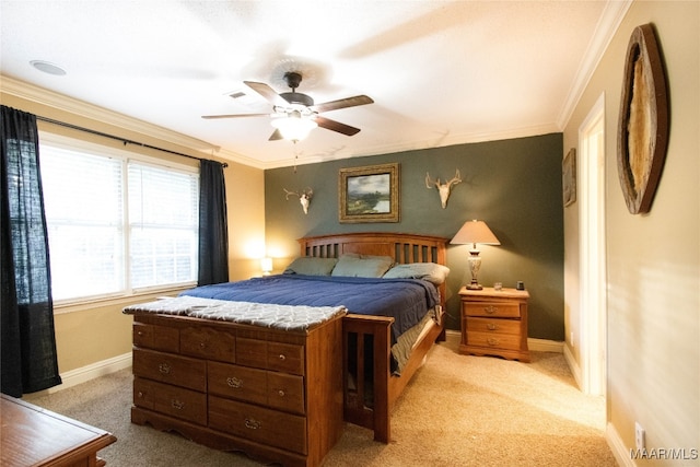 bedroom featuring ceiling fan, light colored carpet, and ornamental molding