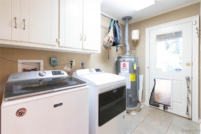 laundry area featuring gas water heater, cabinets, a textured ceiling, independent washer and dryer, and light tile patterned floors