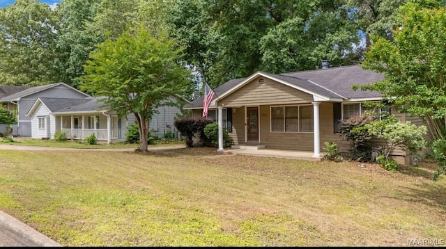 3033 Willow Lane Dr, Montgomery, AL 36109 - ranch-style house with a porch and a front lawn