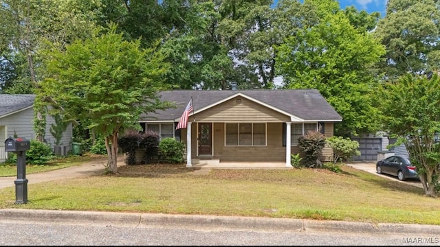 3033 Willow Lane Dr, Montgomery, AL 36109 - ranch-style home with covered porch and concrete driveway