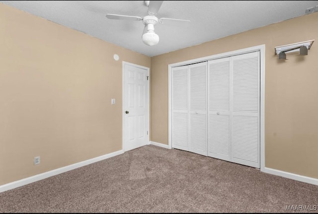 3033 Willow Lane Dr, Montgomery, AL 36109 - unfurnished bedroom with carpet, a closet, baseboards, and ceiling fan