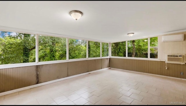 3033 Willow Lane Dr, Montgomery, AL 36109 - unfurnished sunroom featuring a wall mounted AC, wooden walls, and tile patterned flooring