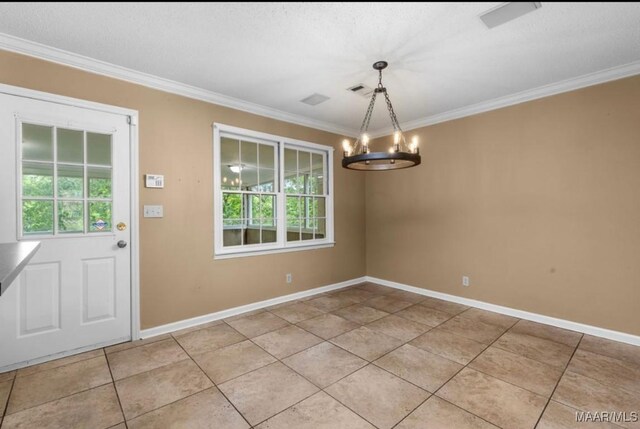 3033 Willow Lane Dr, Montgomery, AL 36109 - unfurnished dining area featuring a chandelier, light tile patterned flooring, crown molding, and baseboards