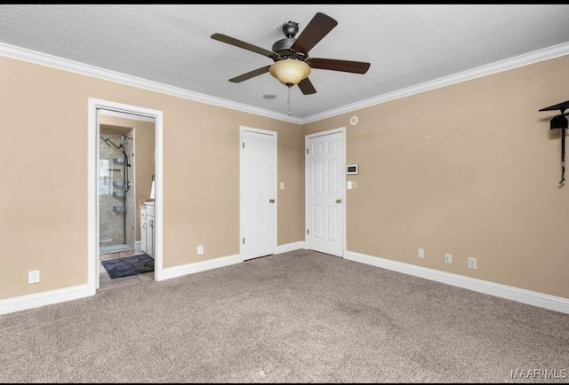 3033 Willow Lane Dr, Montgomery, AL 36109 - unfurnished bedroom with crown molding, carpet floors, baseboards, connected bathroom, and a textured ceiling