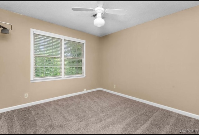 3033 Willow Lane Dr, Montgomery, AL 36109 - carpeted empty room with baseboards and ceiling fan