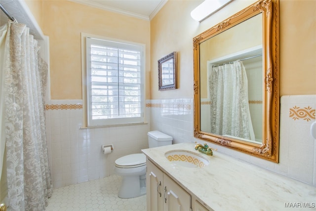 bathroom featuring tile walls, vanity, crown molding, toilet, and tile patterned floors