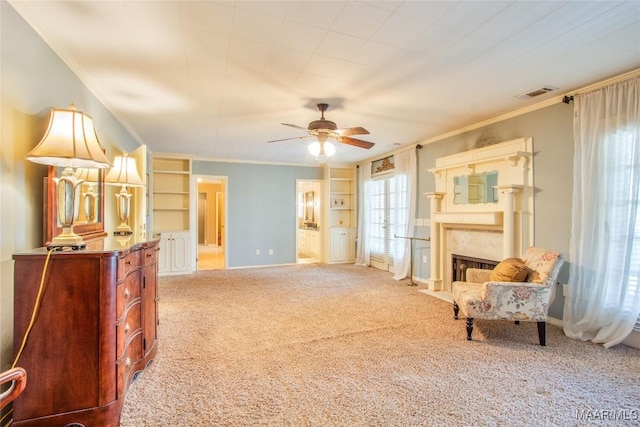 601 N Pickett St, Autaugaville, AL 36003 - living area with carpet flooring, visible vents, ornamental molding, and a ceiling fan