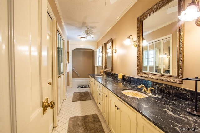 601 N Pickett St, Autaugaville, AL 36003 - bathroom with ornamental molding, a sink, and a ceiling fan