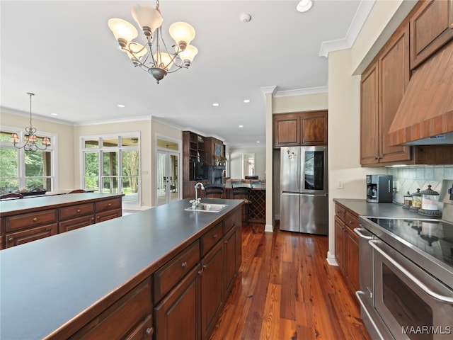 kitchen featuring custom range hood, dark hardwood / wood-style flooring, stainless steel appliances, decorative light fixtures, and a chandelier