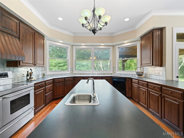 kitchen with dishwasher, sink, a notable chandelier, hanging light fixtures, and range with electric stovetop