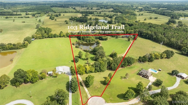 aerial view featuring a water view and a rural view