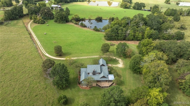 aerial view with a water view and a rural view