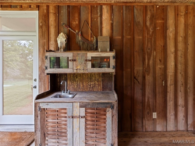 kitchen with wood-type flooring and sink