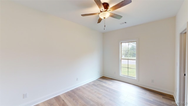 empty room with light hardwood / wood-style floors and ceiling fan