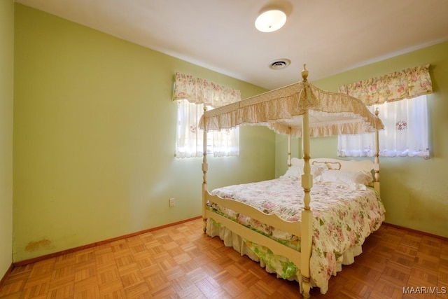 bedroom featuring parquet floors