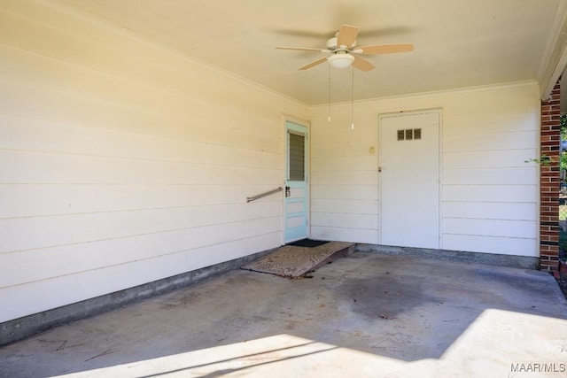 entrance to property featuring ceiling fan