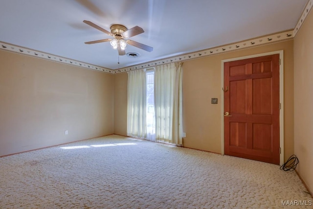 unfurnished room featuring carpet flooring and ceiling fan