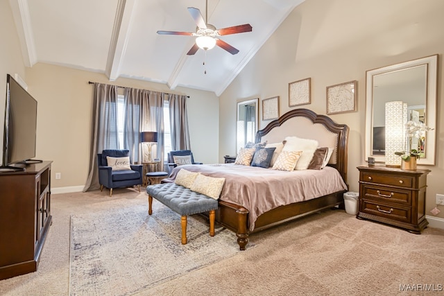 carpeted bedroom featuring high vaulted ceiling, ceiling fan, beamed ceiling, and crown molding