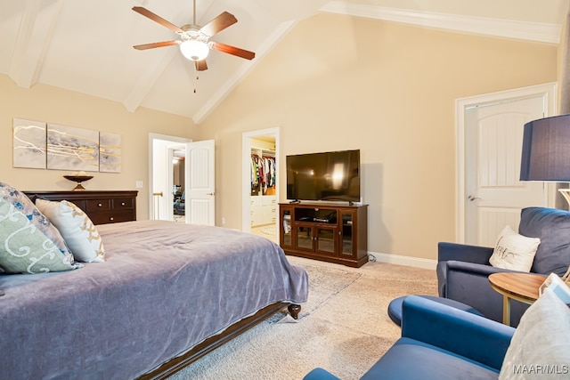 carpeted bedroom with high vaulted ceiling, beamed ceiling, a closet, ceiling fan, and a walk in closet