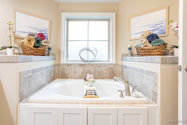 bathroom with a bathing tub