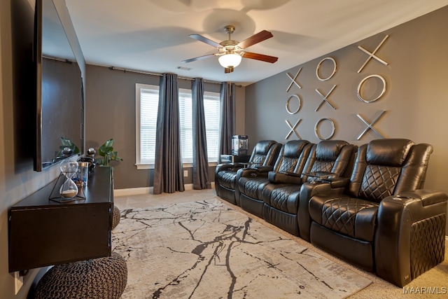 living room with ceiling fan and light colored carpet