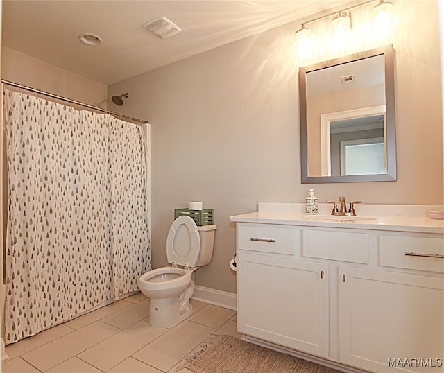 bathroom featuring walk in shower, vanity, tile patterned flooring, and toilet