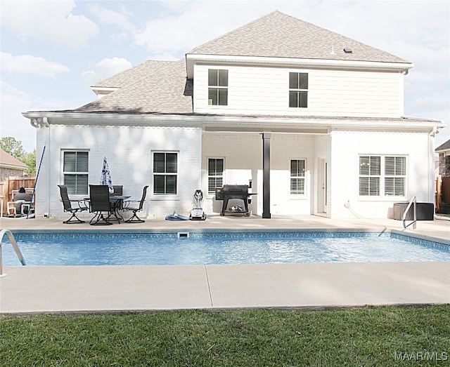 back of house featuring a patio area