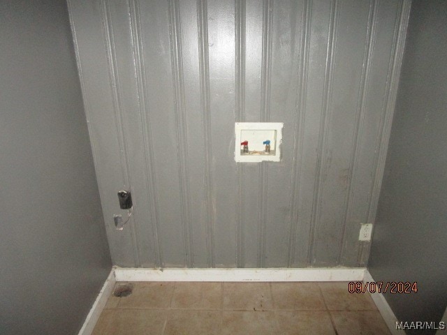 interior details featuring tile patterned floors