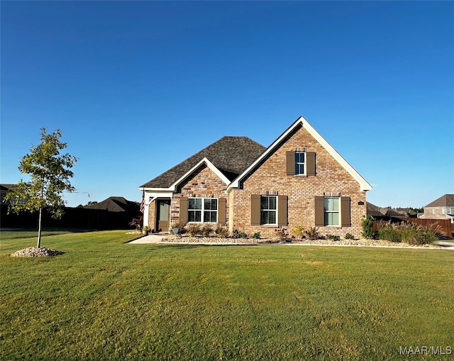 view of front of home with a front lawn