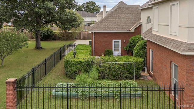 view of home's exterior featuring a lawn