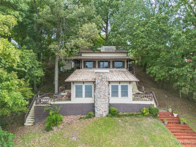 view of front of property with a deck