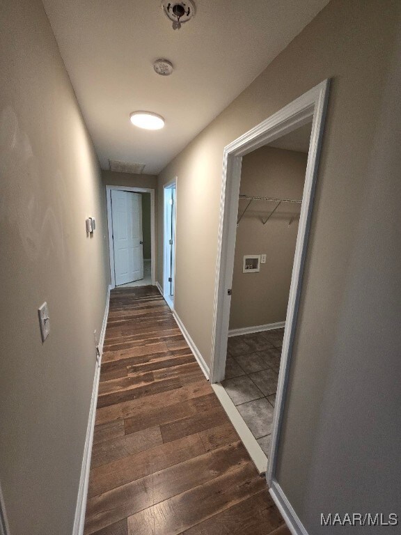 1780 Fitzpatrick Rd, Wetumpka, AL 36092 - corridor with baseboards and wood finished floors