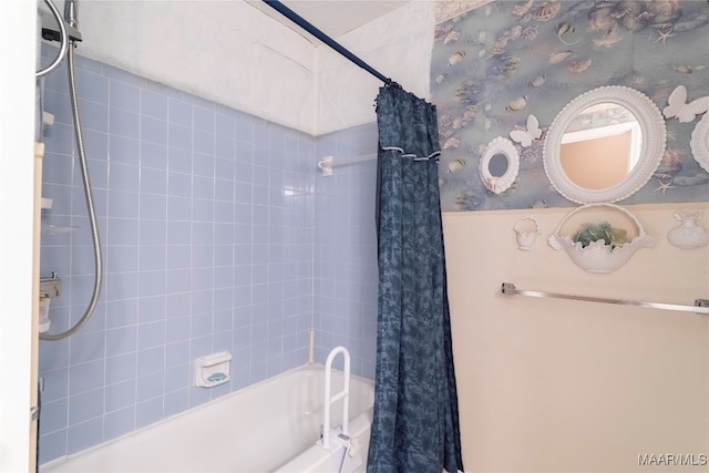 bathroom featuring shower / tub combo with curtain