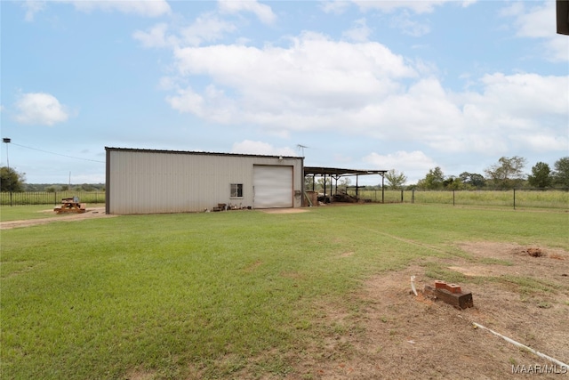 view of outdoor structure with a lawn and a rural view