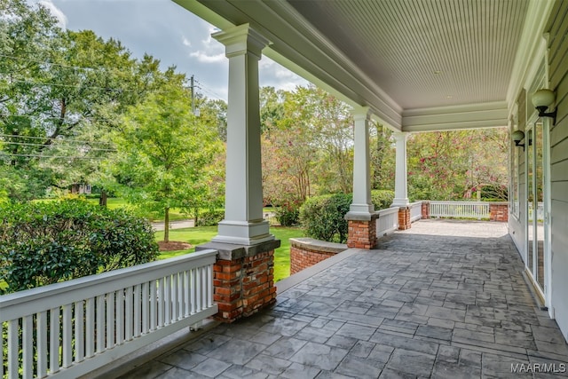 view of patio featuring a porch