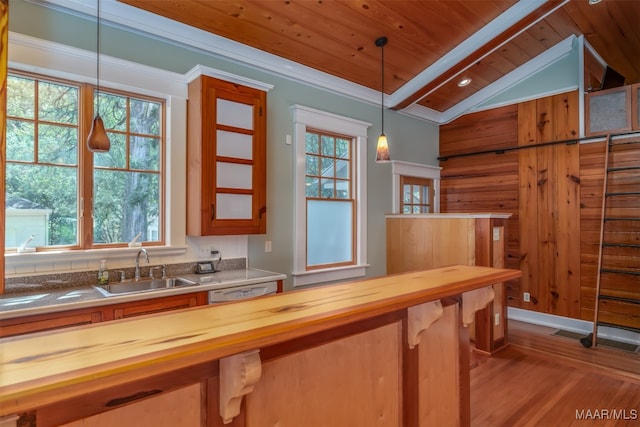 kitchen featuring wood ceiling, light hardwood / wood-style floors, lofted ceiling, butcher block counters, and hanging light fixtures