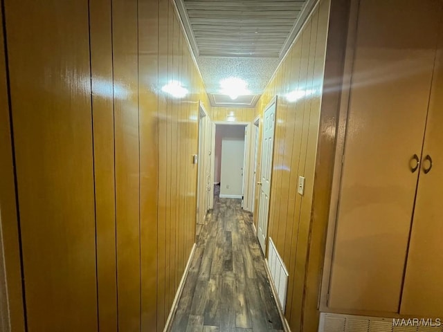 4512 Delray Rd, Montgomery, AL 36116 - corridor with visible vents, wood walls, and dark wood finished floors