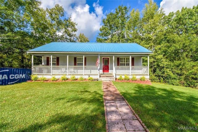 view of front of house with a porch and a front lawn