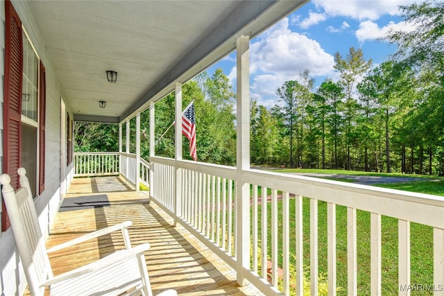 balcony featuring covered porch